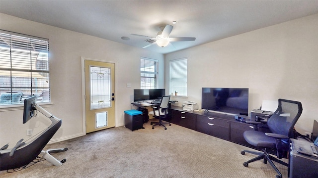 home office featuring ceiling fan and carpet