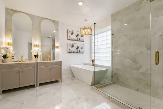 bathroom featuring vanity, plus walk in shower, and a chandelier