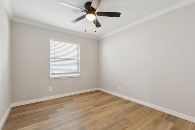 spare room with crown molding, ceiling fan, and light hardwood / wood-style flooring