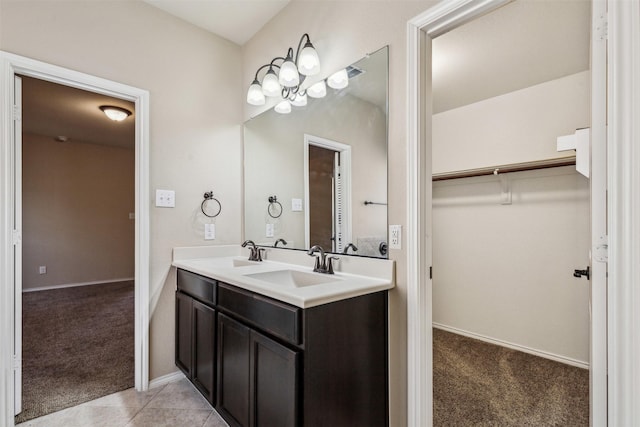 bathroom with vanity and tile patterned flooring