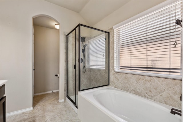 bathroom with vanity, tile patterned flooring, and separate shower and tub