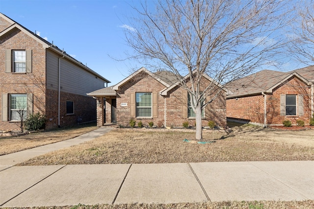 view of front of home with a front lawn