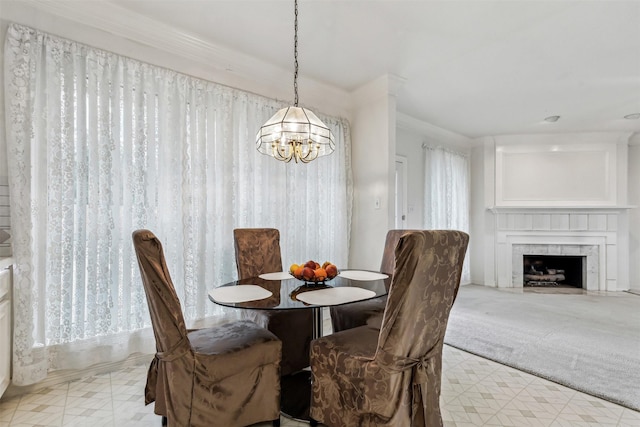 dining area with crown molding