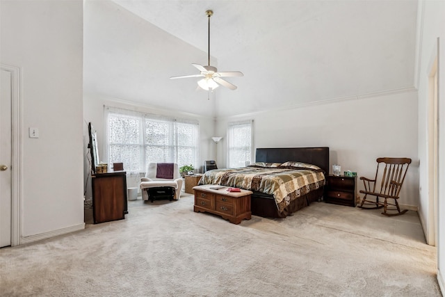 bedroom featuring ceiling fan, lofted ceiling, and light carpet