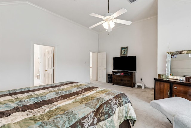 carpeted bedroom featuring crown molding, a towering ceiling, and ceiling fan