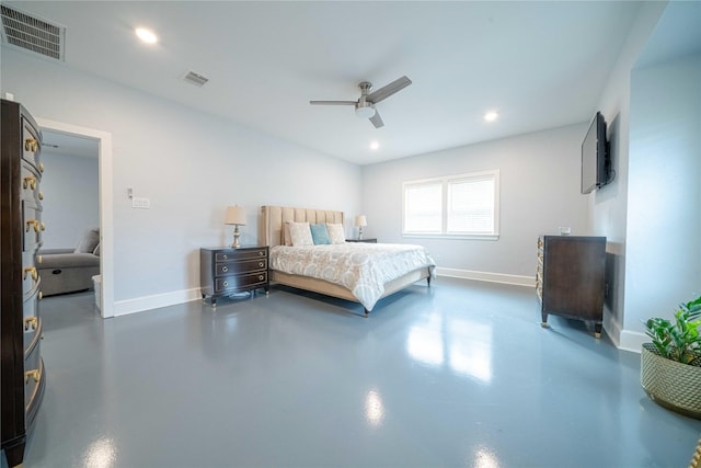 bedroom featuring finished concrete floors, visible vents, and baseboards