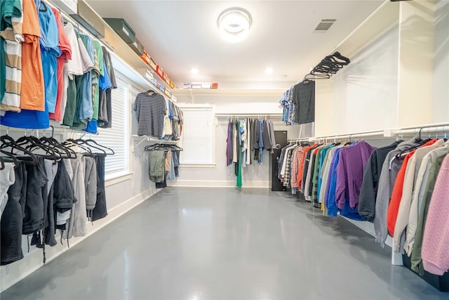 spacious closet featuring visible vents