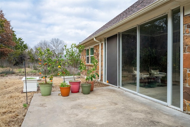 view of patio / terrace featuring fence