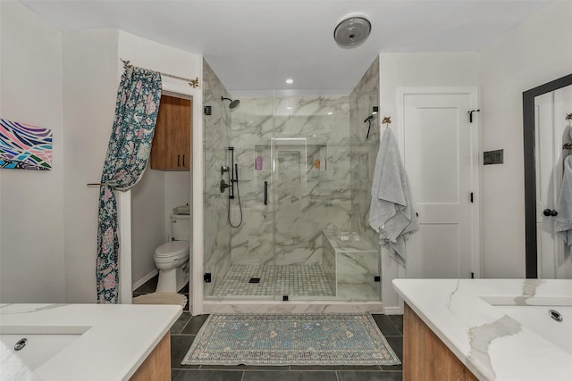 bathroom featuring tile patterned flooring, vanity, toilet, and walk in shower