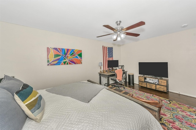 bedroom featuring hardwood / wood-style floors and ceiling fan