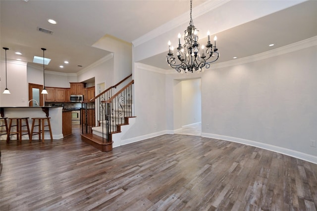 interior space with ornamental molding and dark wood-type flooring