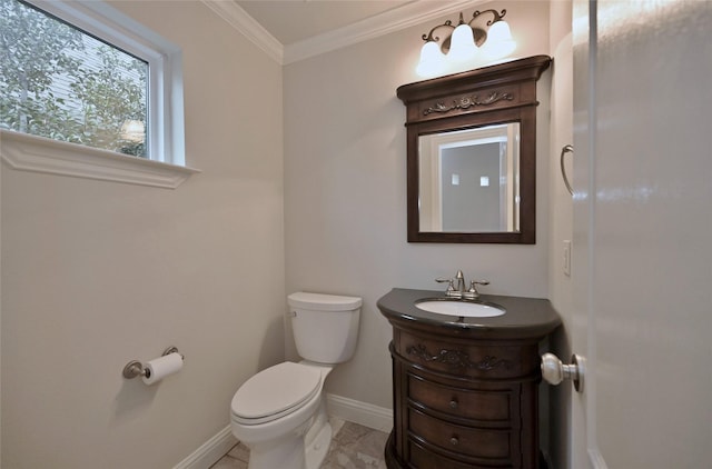 bathroom featuring crown molding, vanity, and toilet