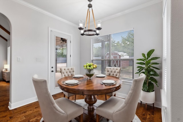 402 N Parkway Dr, Alvarado, TX 76009 - dining area featuring ornamental molding, dark hardwood / wood-style floors, and a chandelier