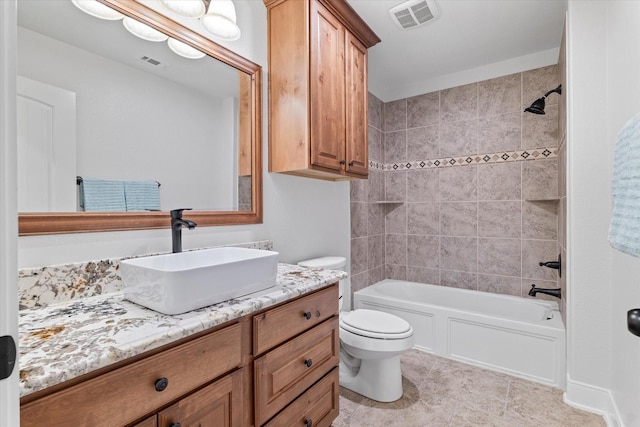 402 N Parkway Dr, Alvarado, TX 76009 - full bathroom with vanity, toilet, and tiled shower / bath