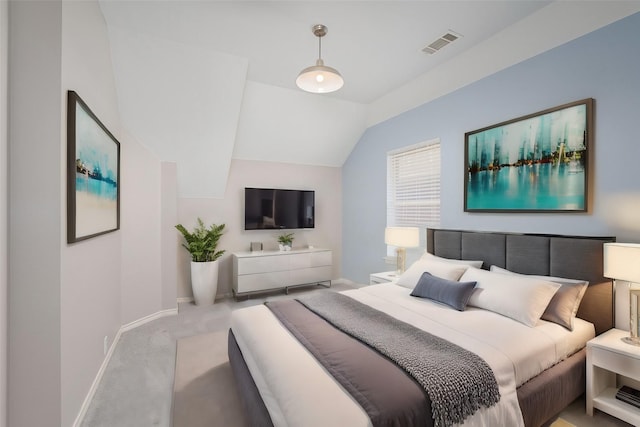 carpeted bedroom featuring lofted ceiling