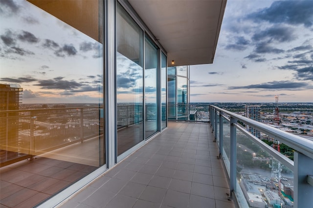 view of balcony at dusk