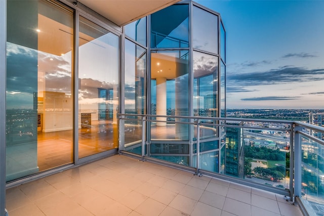 view of balcony at dusk