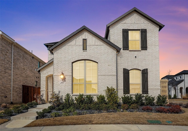 view of french country inspired facade