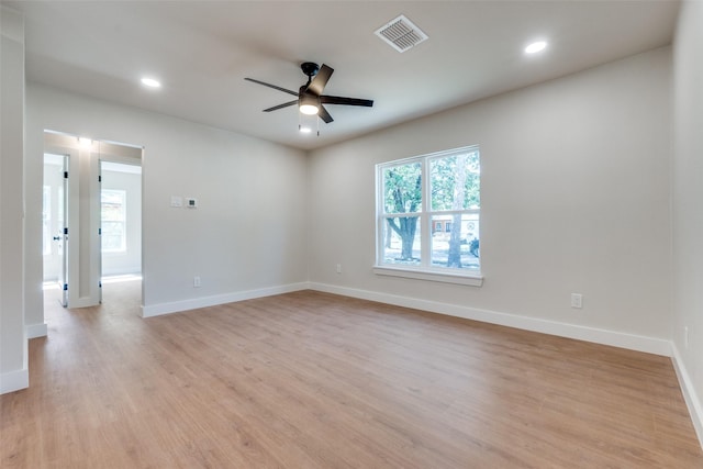 unfurnished room with light hardwood / wood-style flooring and ceiling fan