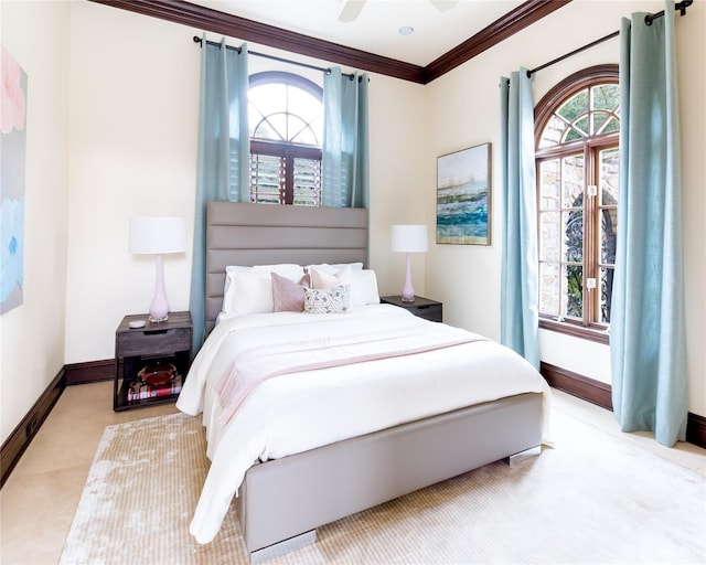 bedroom featuring ornamental molding and ceiling fan