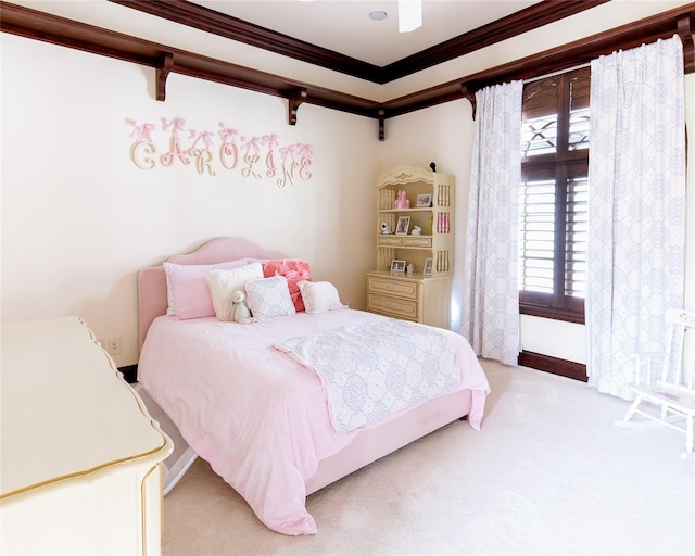 bedroom featuring crown molding and light colored carpet