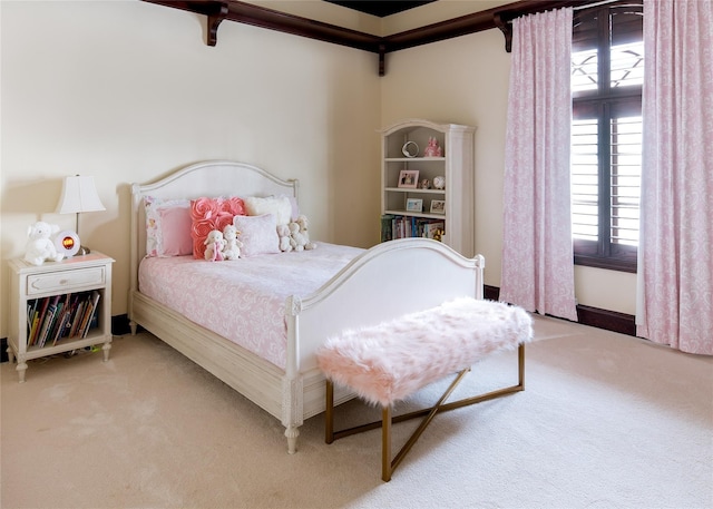 bedroom with carpet flooring and multiple windows