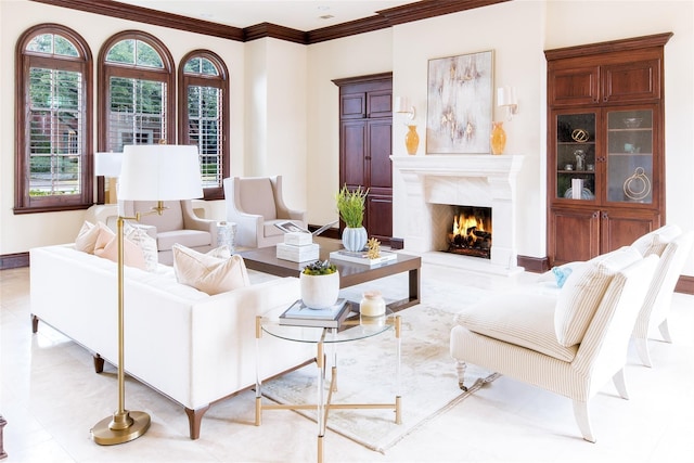 living room with crown molding and a fireplace