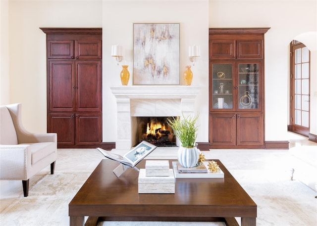 unfurnished living room featuring a fireplace