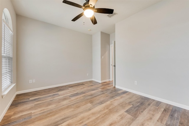 unfurnished room featuring ceiling fan and light hardwood / wood-style floors