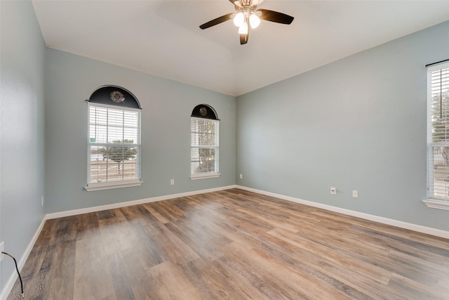 unfurnished room featuring ceiling fan and light wood-type flooring