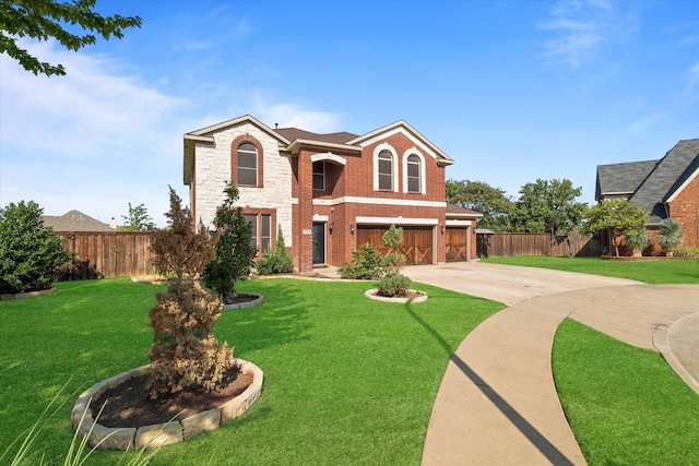 view of front of home featuring a garage and a front lawn