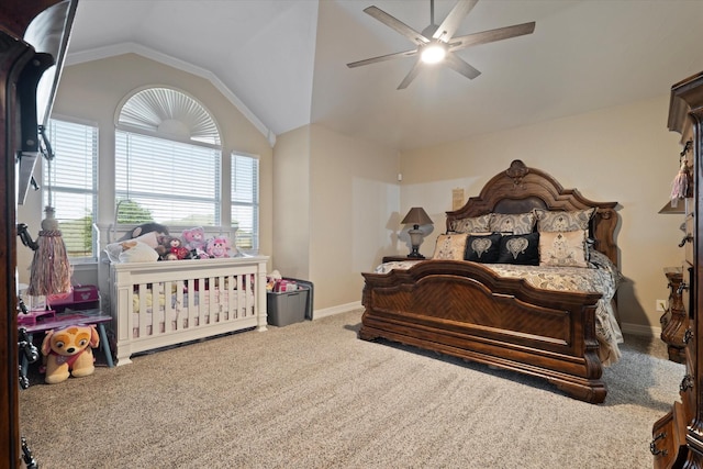 carpeted bedroom with lofted ceiling and ceiling fan