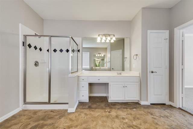 bathroom with vanity and walk in shower