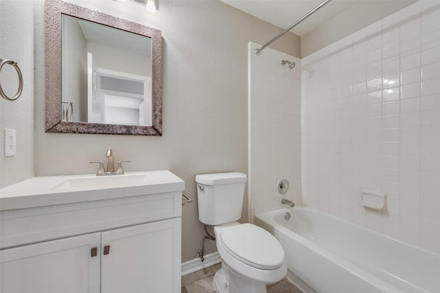 full bathroom featuring vanity, toilet, and tiled shower / bath combo