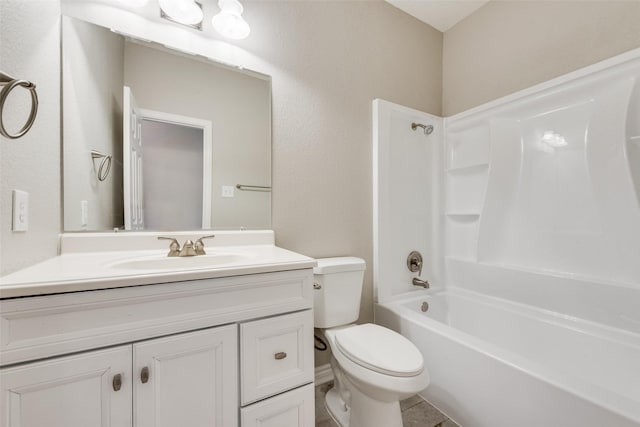 full bathroom featuring vanity, toilet, and washtub / shower combination