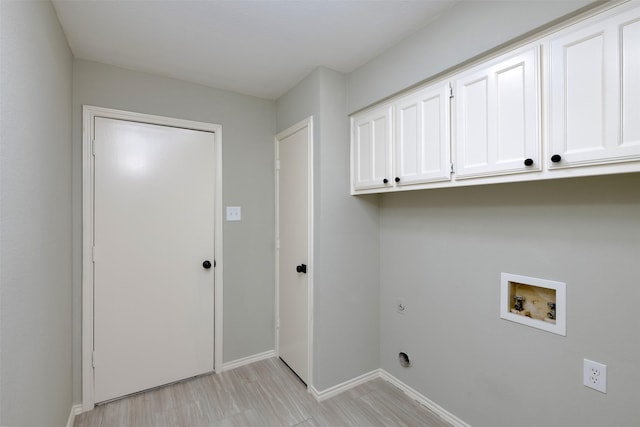 laundry room featuring cabinets, washer hookup, hookup for an electric dryer, and light wood-type flooring