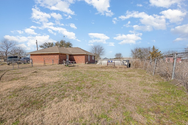 view of yard featuring fence