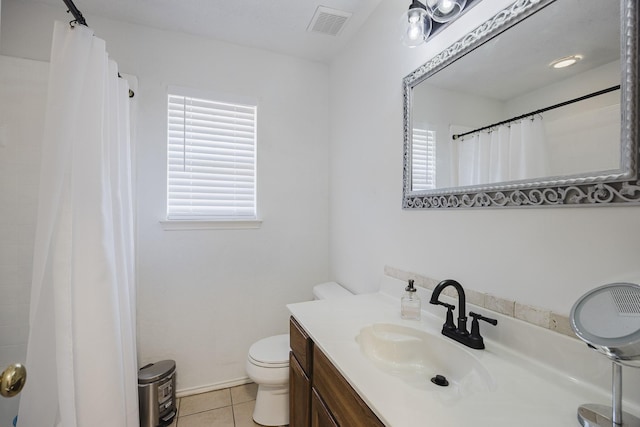 bathroom featuring visible vents, toilet, curtained shower, tile patterned flooring, and vanity