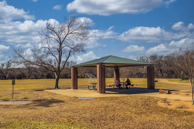 surrounding community featuring a yard and a gazebo