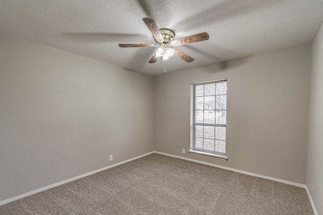 unfurnished room featuring carpet, a textured ceiling, and ceiling fan