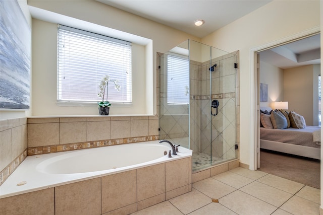 full bathroom with a stall shower, tile patterned flooring, ensuite bath, and a bath