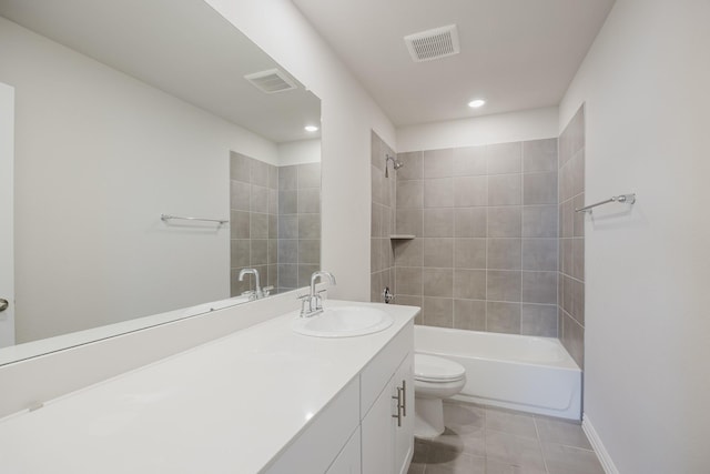 full bath with visible vents, toilet, vanity, and washtub / shower combination