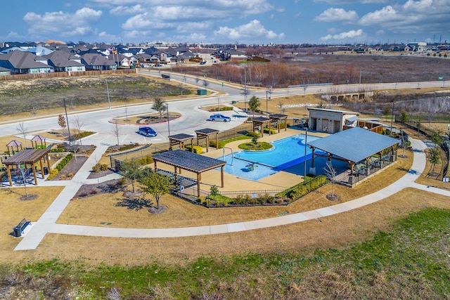 birds eye view of property with a residential view