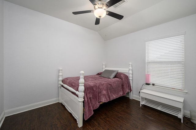 bedroom featuring vaulted ceiling, ceiling fan, and dark hardwood / wood-style flooring