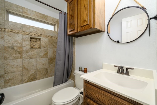 full bathroom featuring vanity, toilet, and shower / bath combo