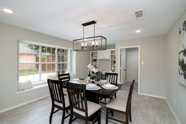 dining area with light wood-type flooring