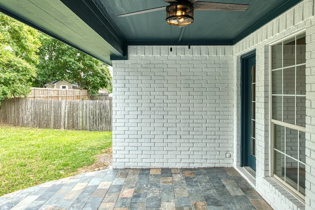 view of patio featuring ceiling fan