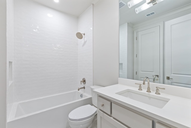 full bathroom with tiled shower / bath combo, vanity, and toilet