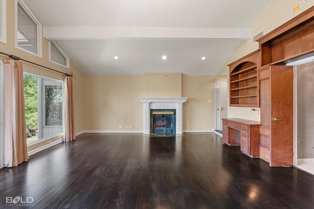 unfurnished living room with a high end fireplace, dark hardwood / wood-style floors, and lofted ceiling with beams