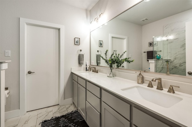 bathroom featuring vanity and an enclosed shower